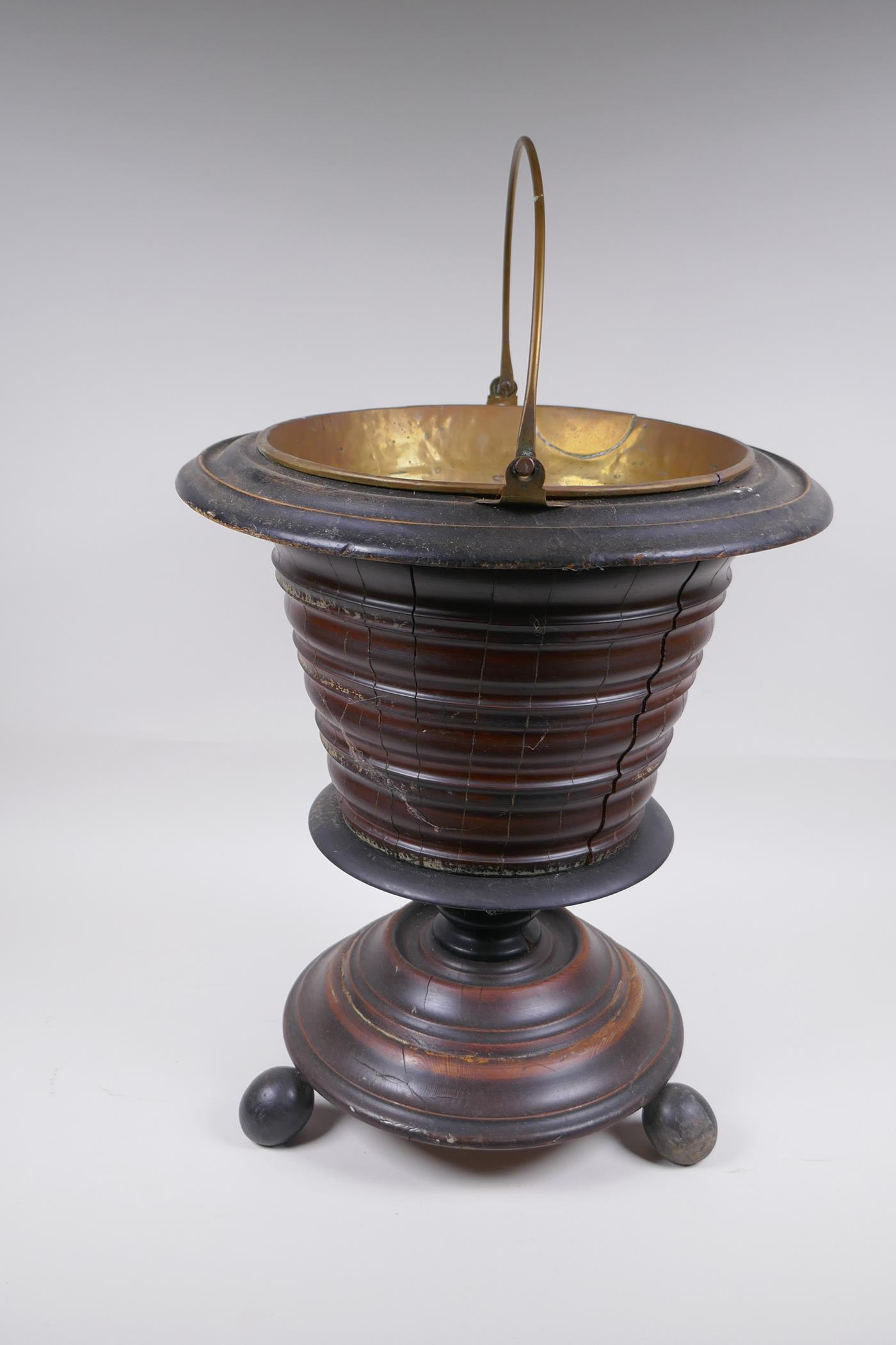 A Dutch coopered wood and brass lined peat bucket/champagne cooler, raised on ball feet, 42cm - Image 4 of 5