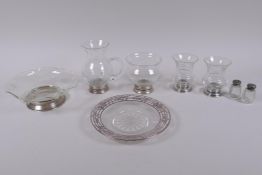 A collection of silver and white metal mounted glass vases and dishes, largest 16cm diameter