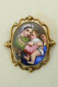 A yellow metal brooch (tests as gold) inset with an enamel miniature after Raphael, the Madonna