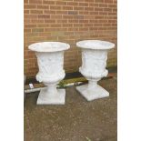 A pair of painted concrete garden urns, decorated with Greco-Roman figures, 90cm high x 60cm