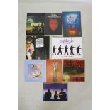 Nine vintage concert programs including Genesis, Phil Collins, Bryan Ferry, David Lee Roth, Simple