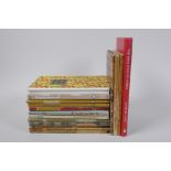 A collection of assorted vintage King Penguin books, including A Book of Roses, The Flowers of the