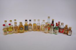 A quantity of 70s and 80s spirits miniatures, mostly whisky including The Original Hundred Pipers