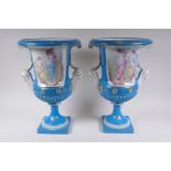 A pair of Sevres style porcelain two handled urns with decorative panels depicting classical maidens