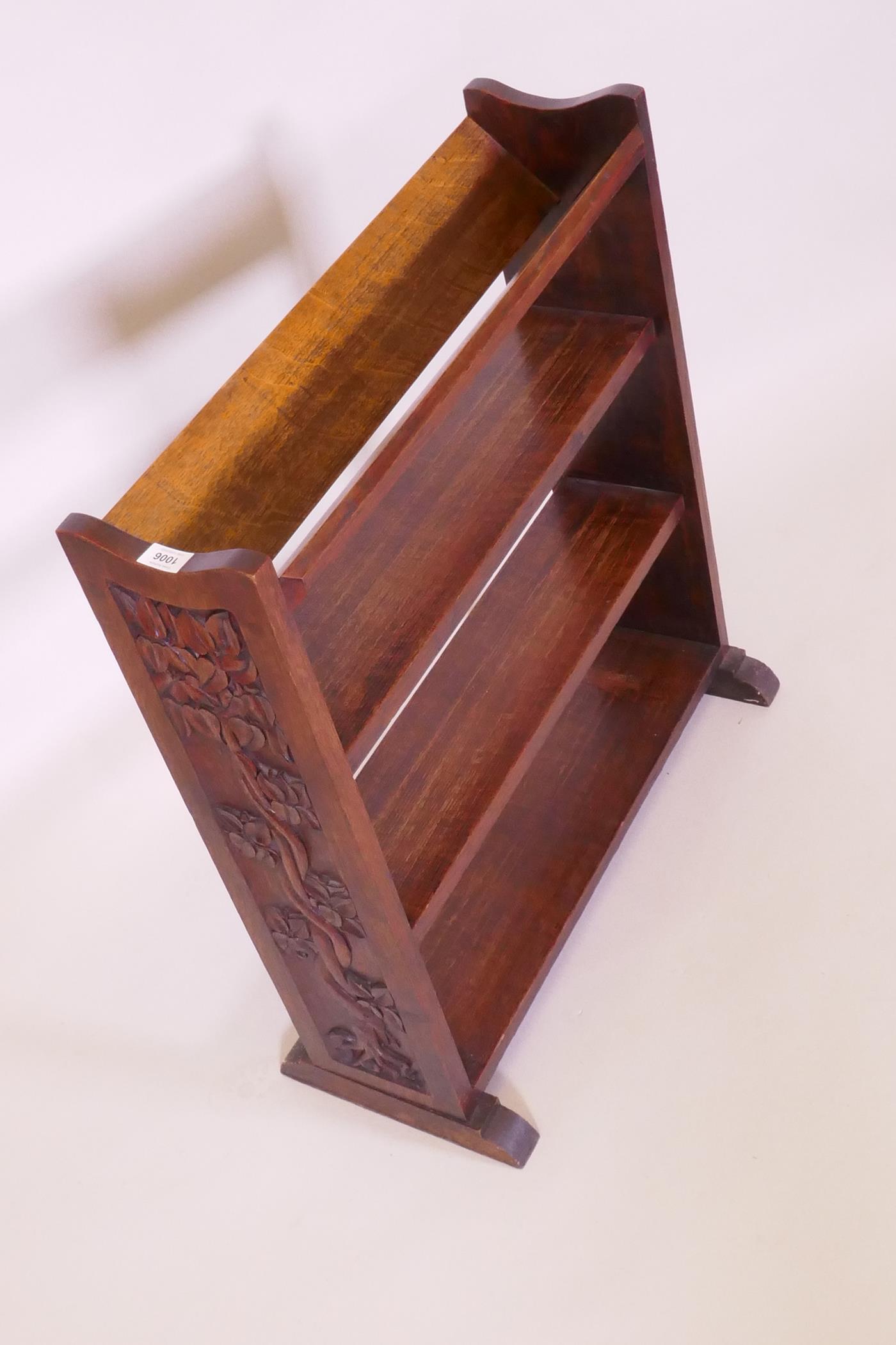 An Arts & Crafts oak open bookshelf with trough top, the sides carved with a serpent coiled around a - Image 2 of 4