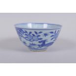 A blue and white porcelain rice bowl decorated with animals and a peach tree, Chinese Jia Jing 6