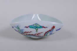 A Doucai porcelain bowl of triangular form decorated with dragons in flight, Chinese Chenghua 6