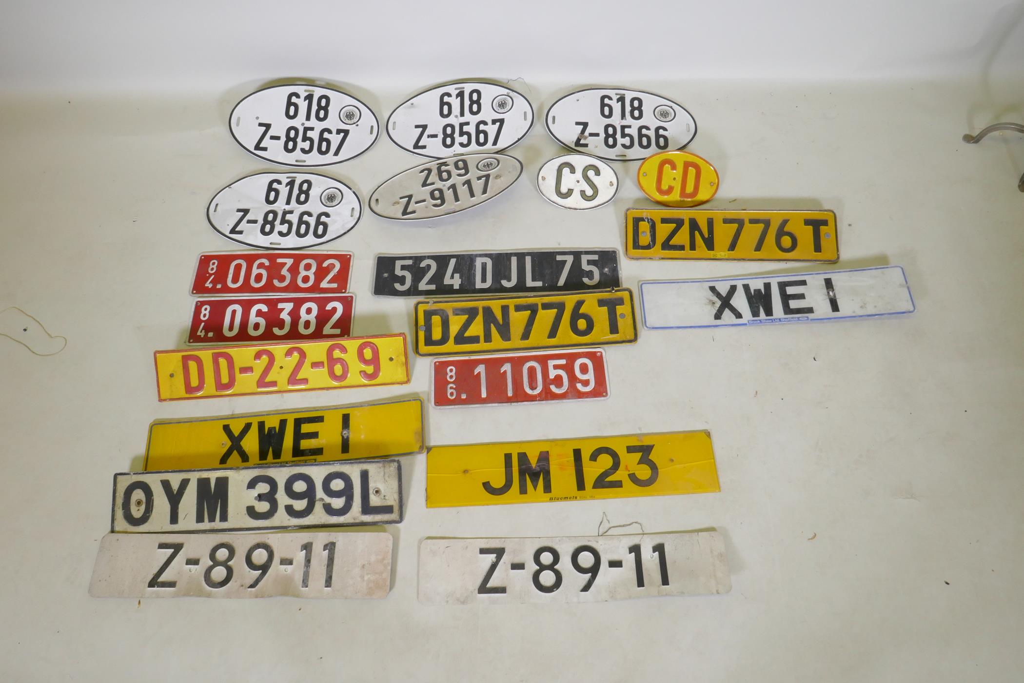 A quantity of car number/licence plates