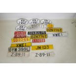 A quantity of car number/licence plates