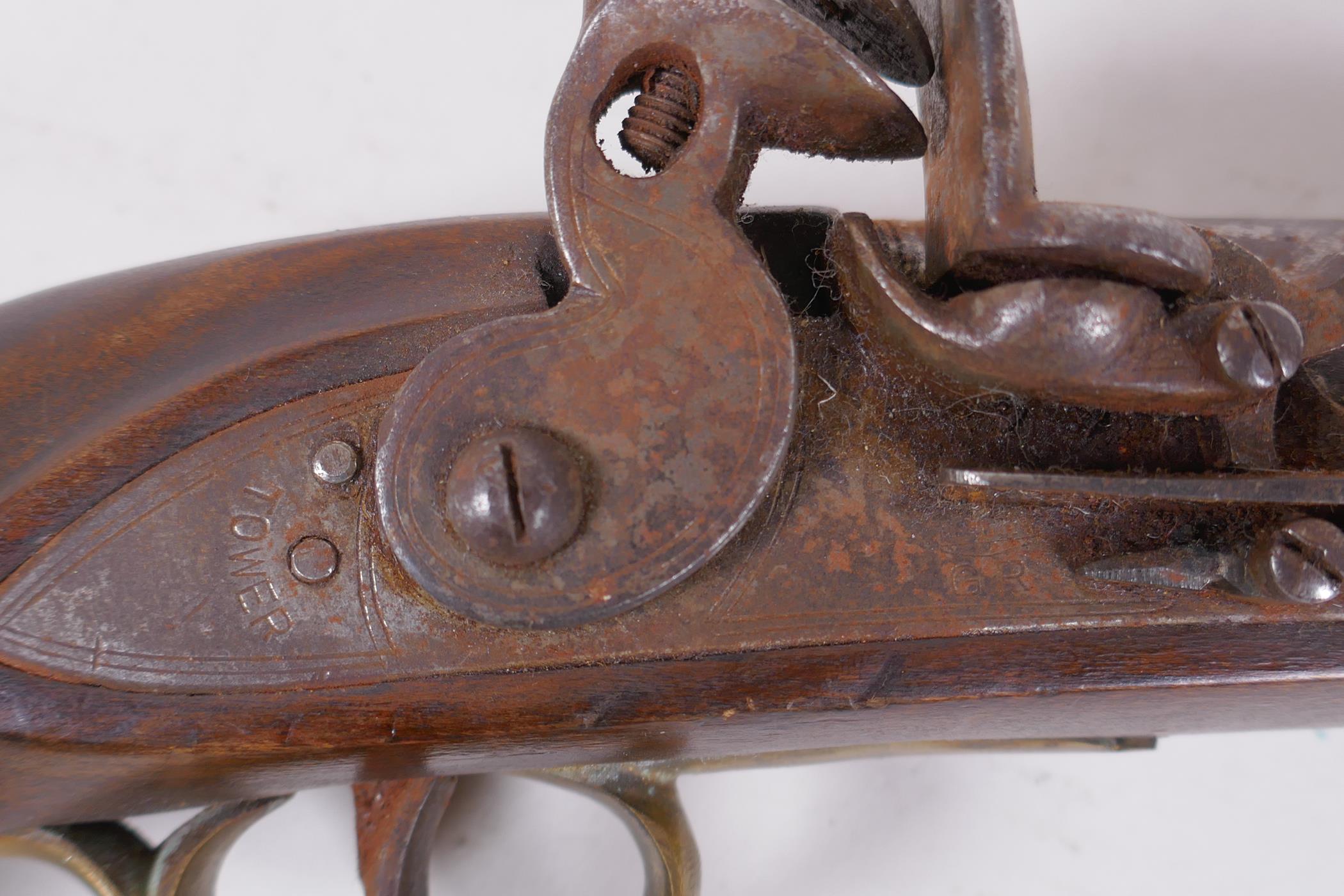 A late C18th/early C19th flintlock pistol, barrel 23cm long, the lock stamped Tower on a crown - Image 2 of 6