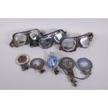 Two pairs of vintage Stadium motorcycle goggles and another similar pair, all early to mid C20th,