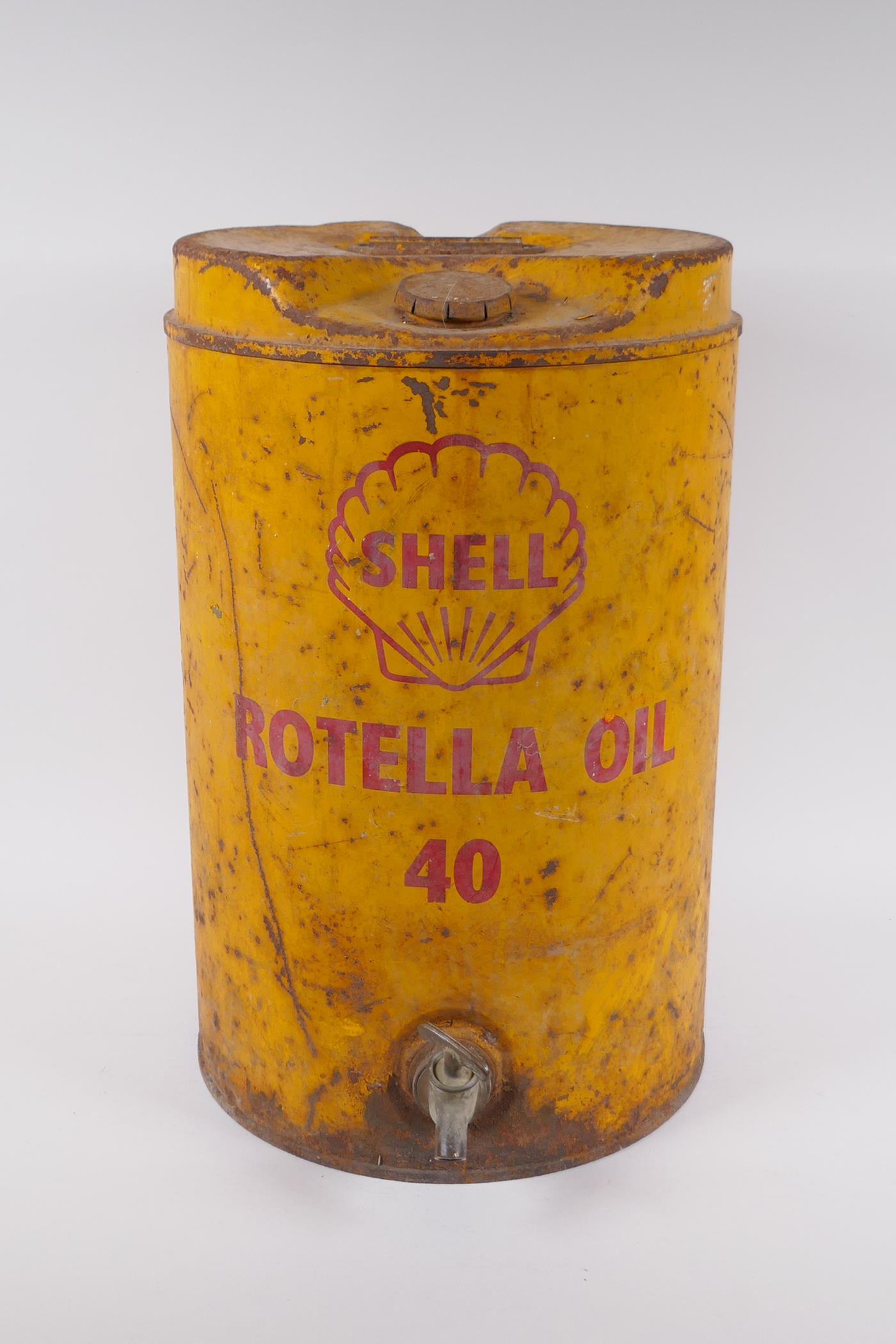 A vintage Shell Rotella Oil 40 1 gallon can, 44cm high x 28cm diameter