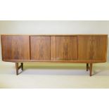 A mid century Danish sideboard, designed by E.W. Bach for Sejling Skaed Silkeborg, four sliding