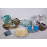 A collection of eleven studio pottery pieces, including a Vivienne Ross plate and a Hugh West studio