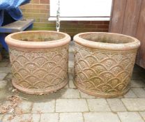 A pair of antique terracotta garden pots, 40cm high x 50cm diameter