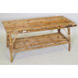 A two tier bamboo occasional table, 102 x 48cm, 45cm high