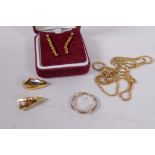 An 18ct gold chain, 63cm long, 11.4g and two pair of 9ct gold earrings, 3g and a gold ring, 1.9g