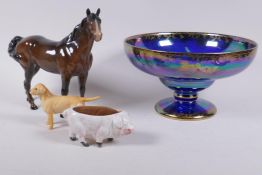 A Beswick horse and Labrador, and a pottery pig pin cushion, and a Fieldings Lustreware footed bowl,