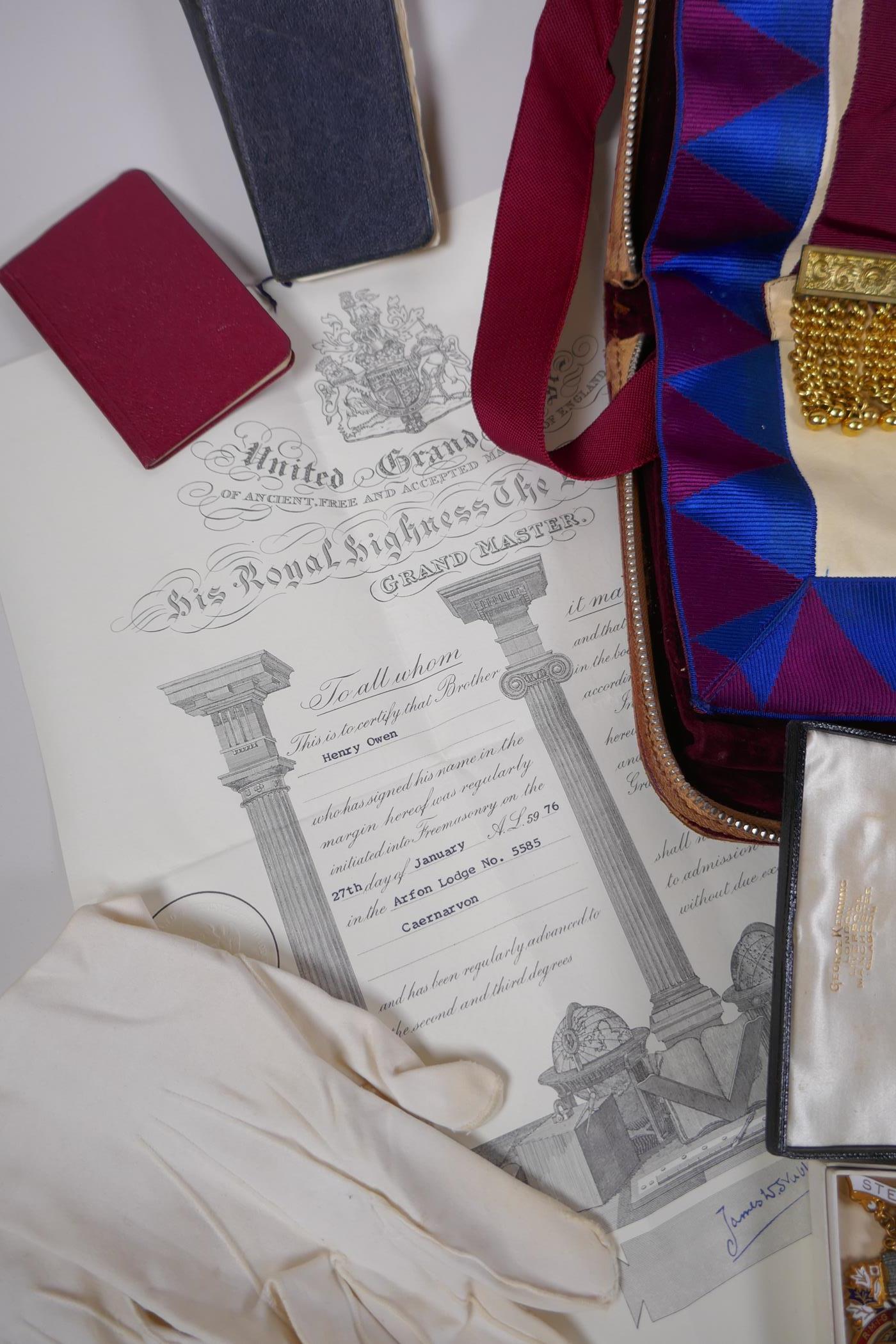 A collection of Masonic regalia to include an apron, sash, assorted medals (some silver) and a - Image 6 of 6