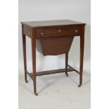 A C19th mahogany work table, the single drawer with fitted interior and pull out basket under,