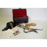 A Royal Navy ship's officer's dress uniform, hat, sword, belt and epaulettes belonging to Surgeon