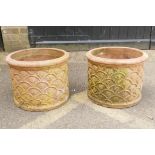 A pair of antique terracotta garden pots, 32cm high x 40cm diameter