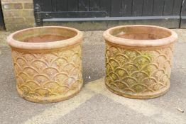 A pair of antique terracotta garden pots, 32cm high x 40cm diameter