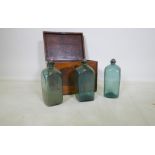Three C19th surgeon's medicine/apothecary bottles, in a fitted mahogany and burr walnut case with