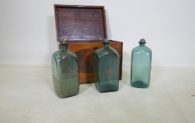 Three C19th surgeon's medicine/apothecary bottles, in a fitted mahogany and burr walnut case with