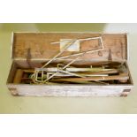An antique croquet set, appears complete, boxed