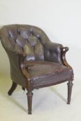 A William IV button back leather desk chair, repairs