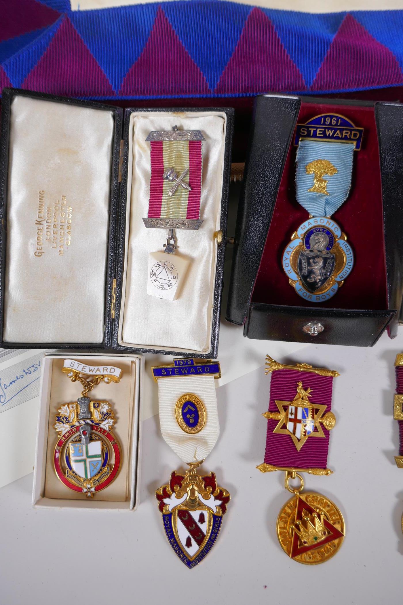 A collection of Masonic regalia to include an apron, sash, assorted medals (some silver) and a - Image 2 of 6