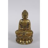 A Sino Tibetan filled bronze Buddha, double vajra mark to base, 11cm high