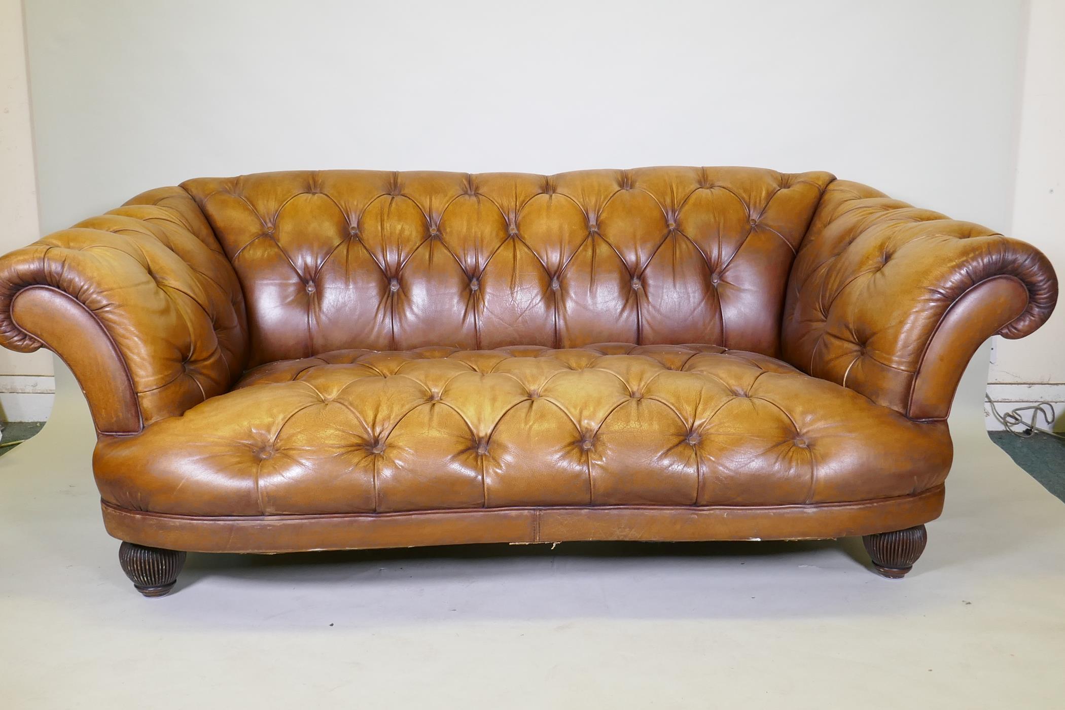 A Tetrad button leather Chesterfield style sofa, 2109cm wide