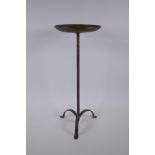 An Arts & Crafts style gilt wrought metal occasional stand, 51cm high