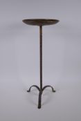 An Arts & Crafts style gilt wrought metal occasional stand, 51cm high