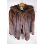 A vintage lady's short fur cape