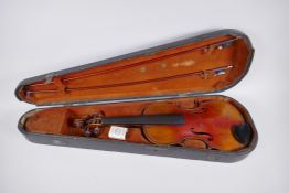 A C19th violin and associated equipment, in a wood case, 59cm long