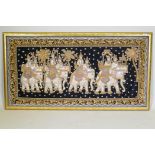 An Indian stumpwork depicting a procession with elephants, mounted in a gilt frame, 82 x 155cm