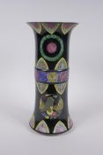 A Chinese famille noir porcelain gu shaped vase with phoenix and lotus flower decoration,