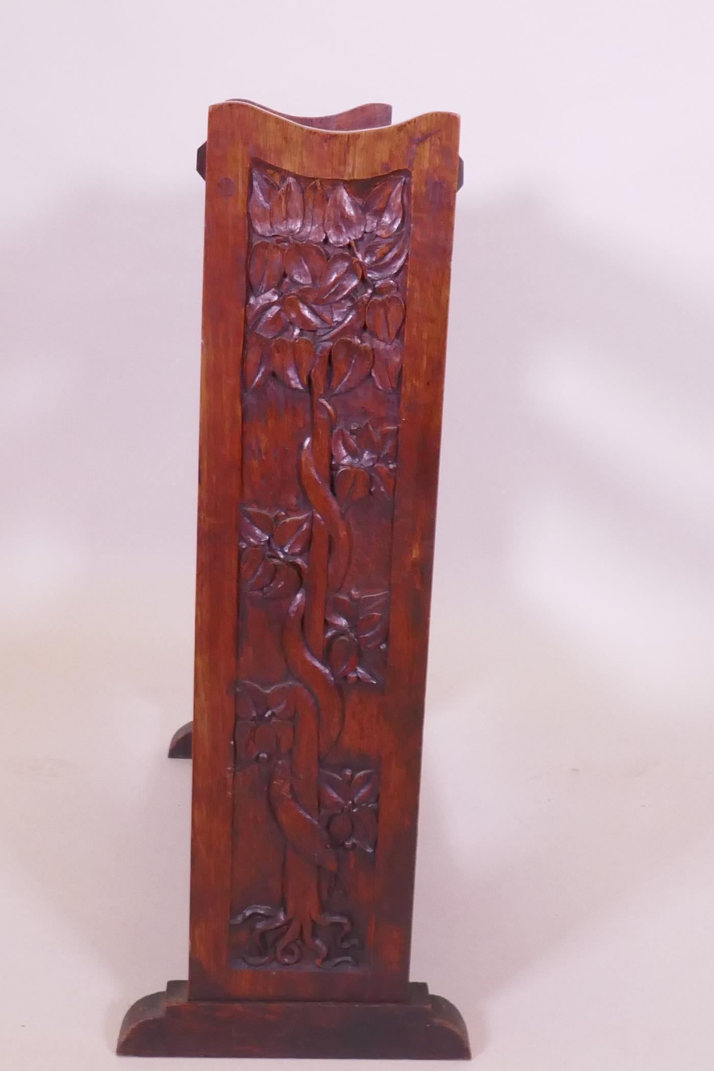 An Arts & Crafts oak open bookshelf with trough top, the sides carved with a serpent coiled around a - Image 4 of 4