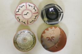 A slip glazed Horezu pottery dish, impressed G.H. Lorga, a Moray Miller studio pottery bowl with Art