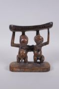 An African Luba tribe carved wood head rest, 18cm high