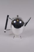 A Christopher Dresser style silver plated teapot, 18cm high