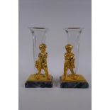 A pair of gilt bronze glass stem vases with figural decoration of a child, after Louis Kley, mounted