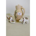 An Ashtead Pottery jug and cover, c1928, with reed decoration on a pearl barley ground, a Corona