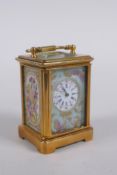 A miniature ormolu and Sevres style porcelain carriage clock, 6cm high