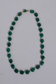 A malachite bead and seed pearl necklace with a 9ct gold clasp, 33cm long