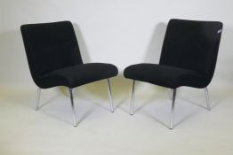 A pair of Walter Knoll Classic Edition chairs, raised on chromed supports
