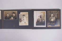 A Japanese photograph album containing portrait photographs from the late C19th and early C20th